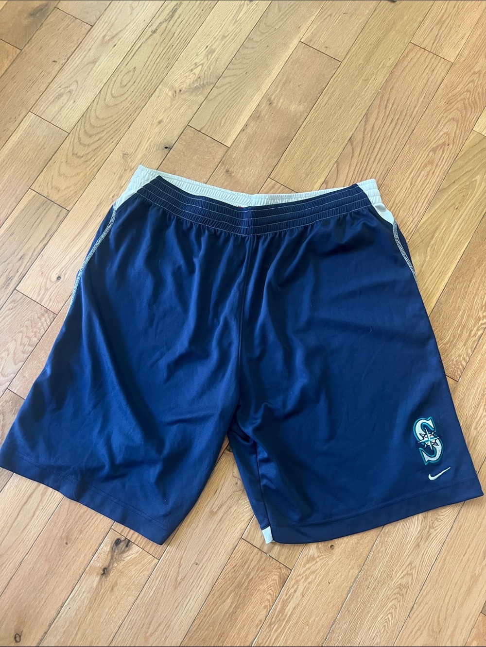 Nike Men’s Navy Athletic Shorts with Teal Mariners Logo